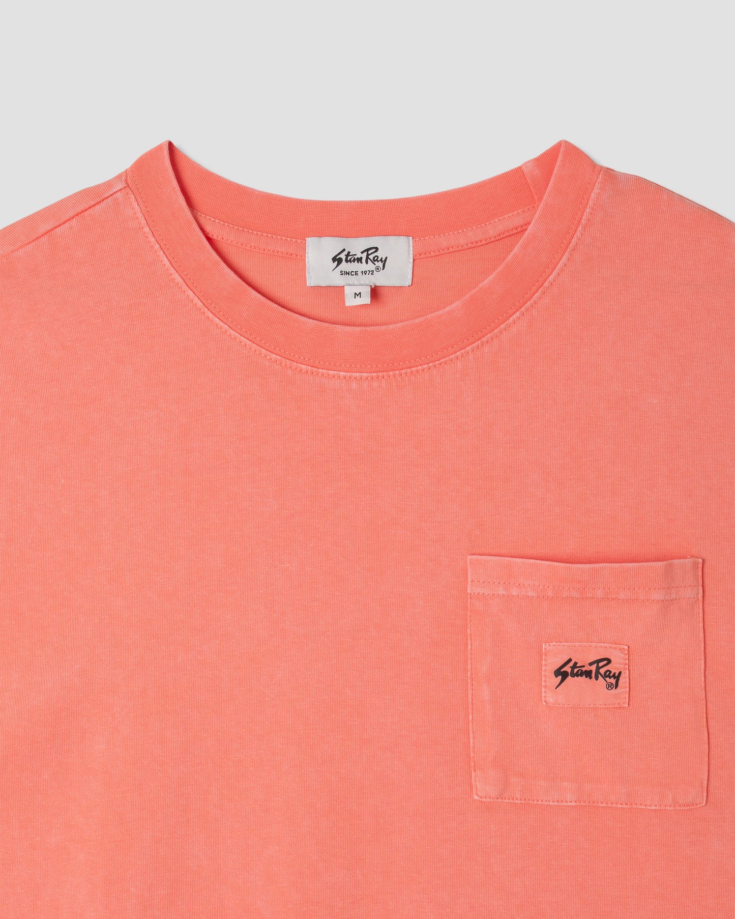 T-Shirt mit aufgesetzter Tasche (verwaschenes Orange)