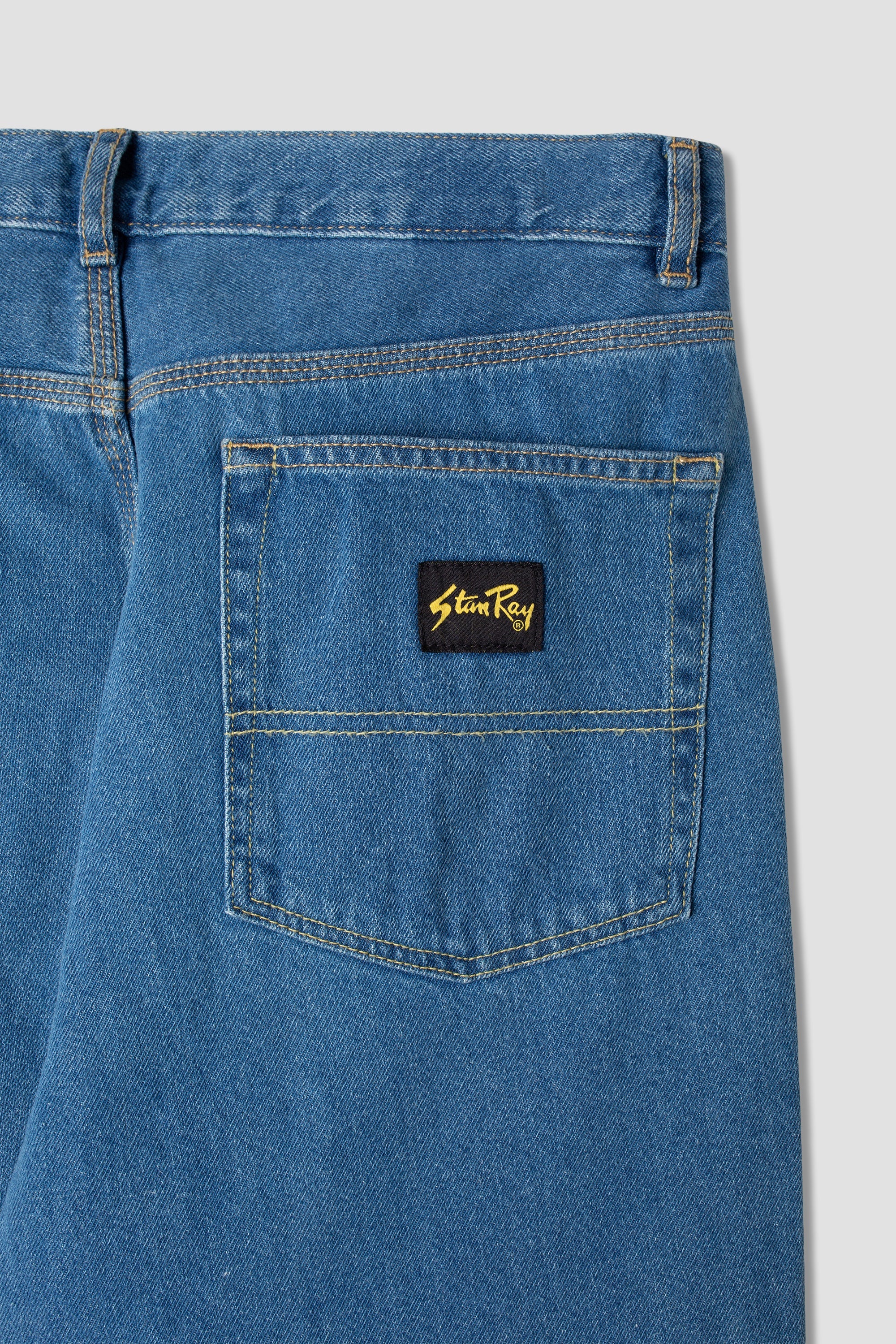 5-Pocket-Taper (mittlerer Stonewash-Denim)