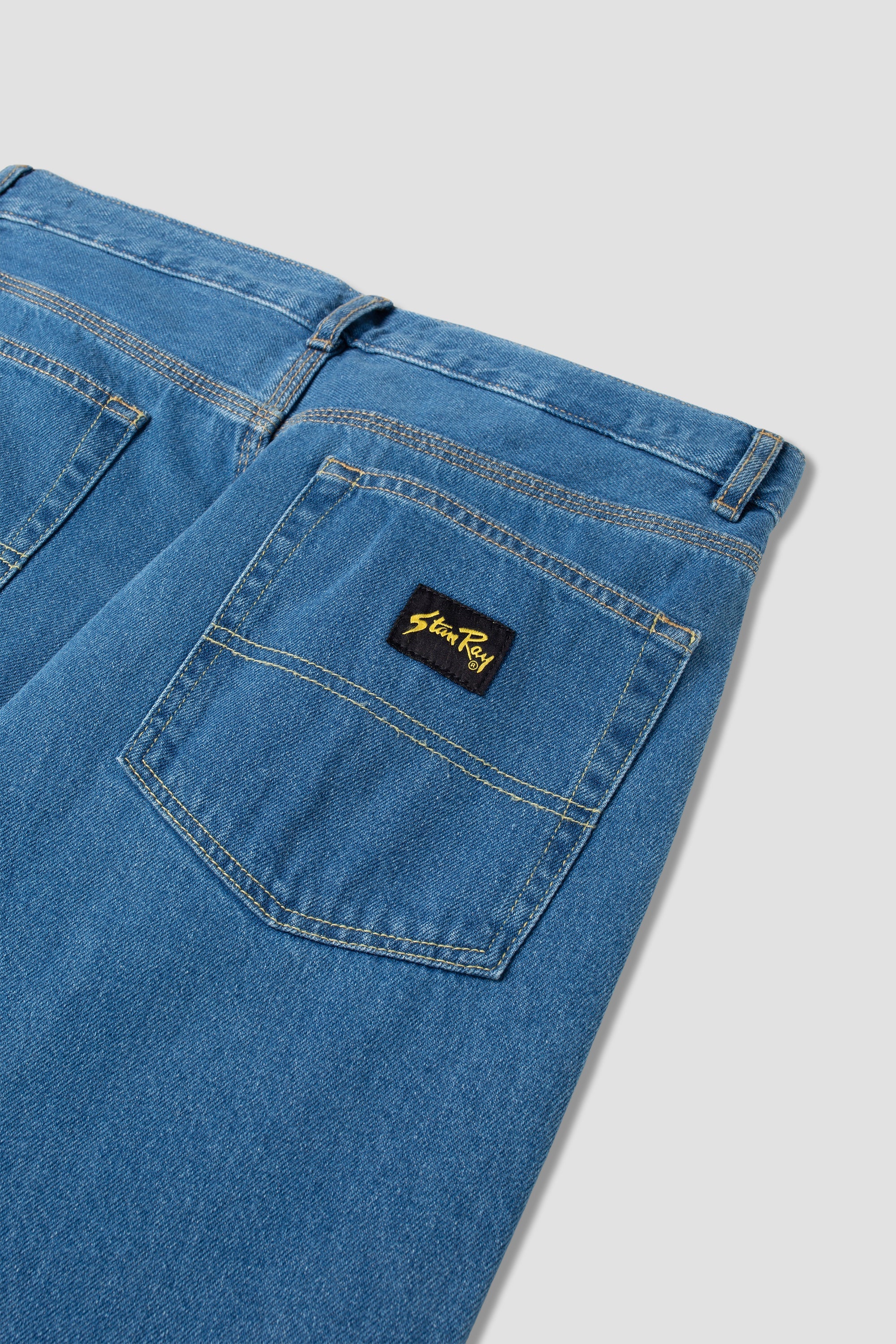 5-Pocket-Taper (mittlerer Stonewash-Denim)