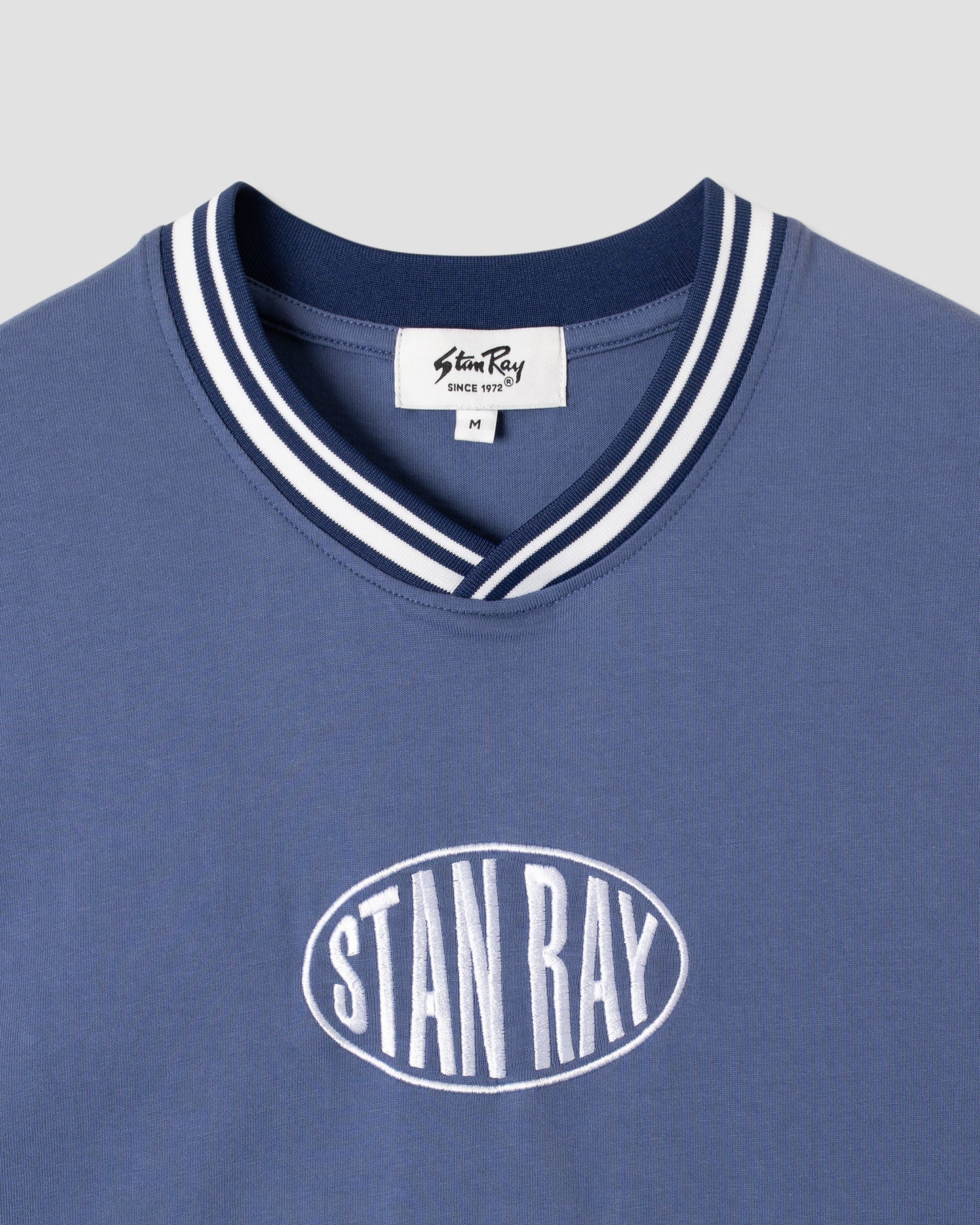 Ovales T-Shirt der 90er (Battle Blue)
