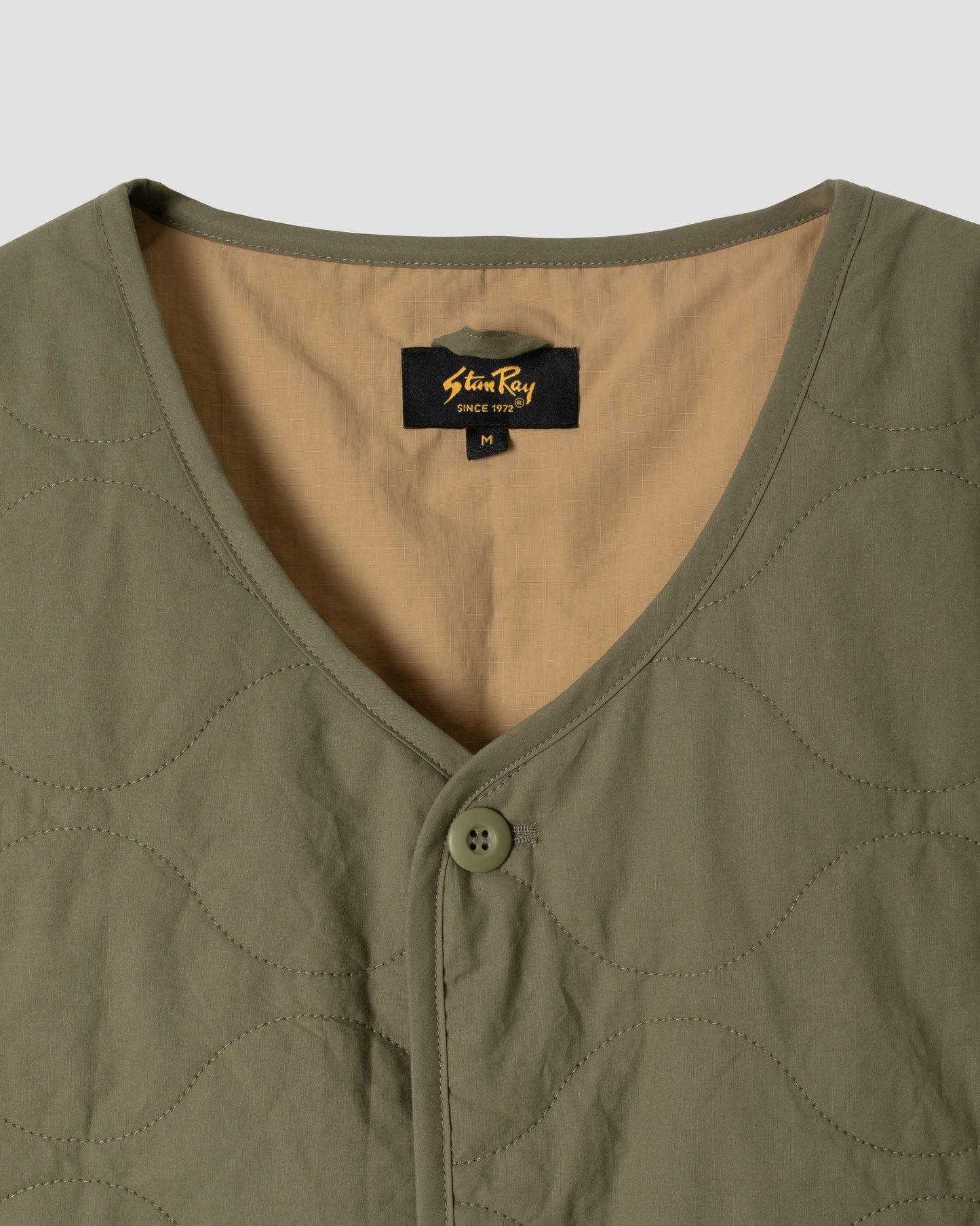 Gilet doublé (olive)