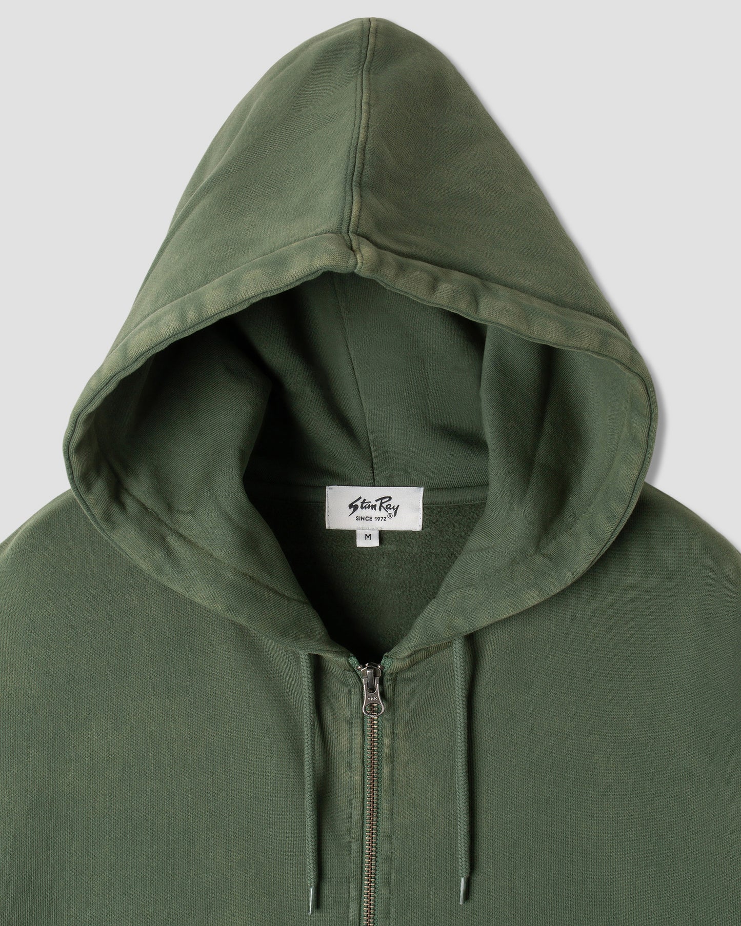 Capuche zippée avec patch (vert délavé)