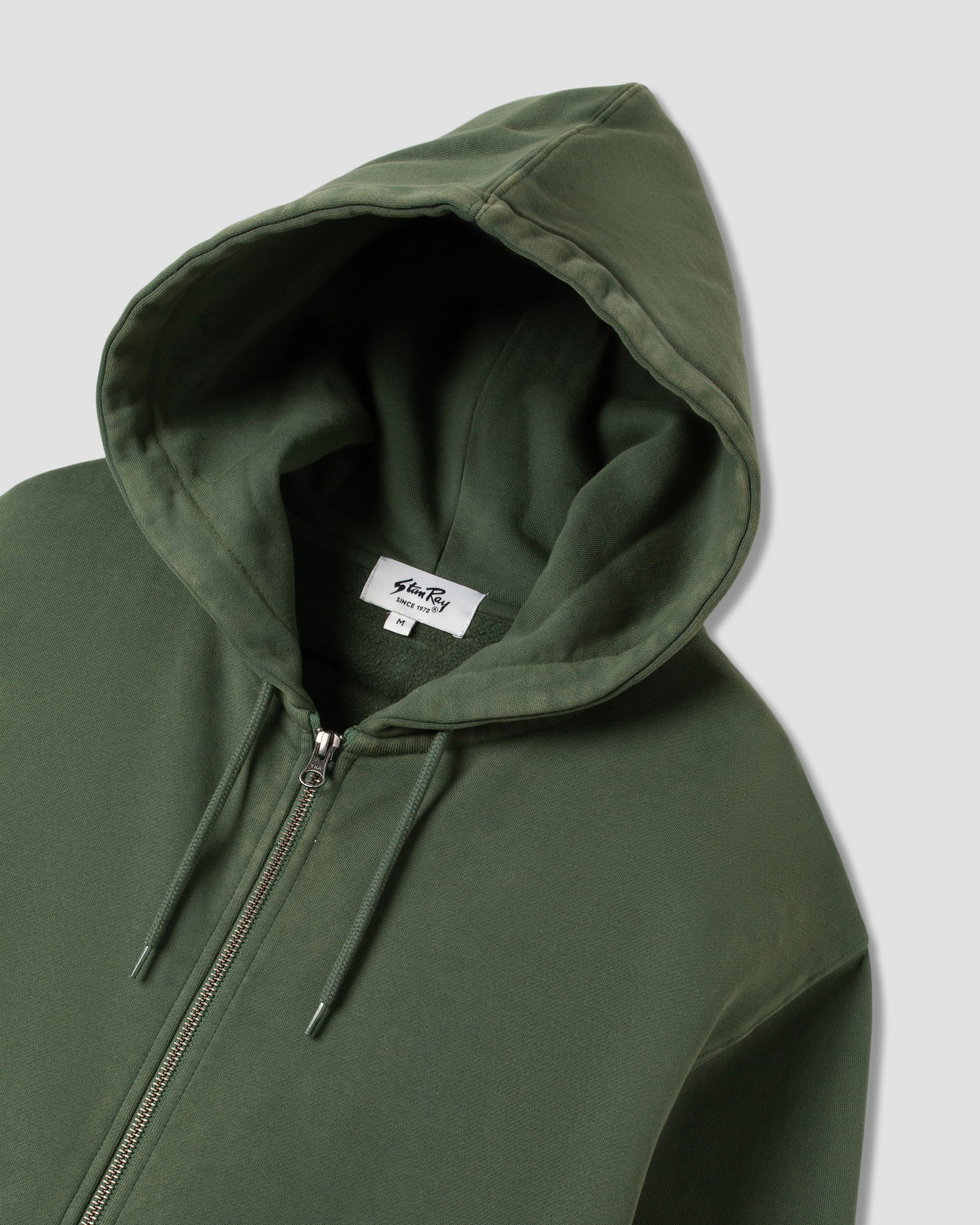 Capuche zippée avec patch (vert délavé)