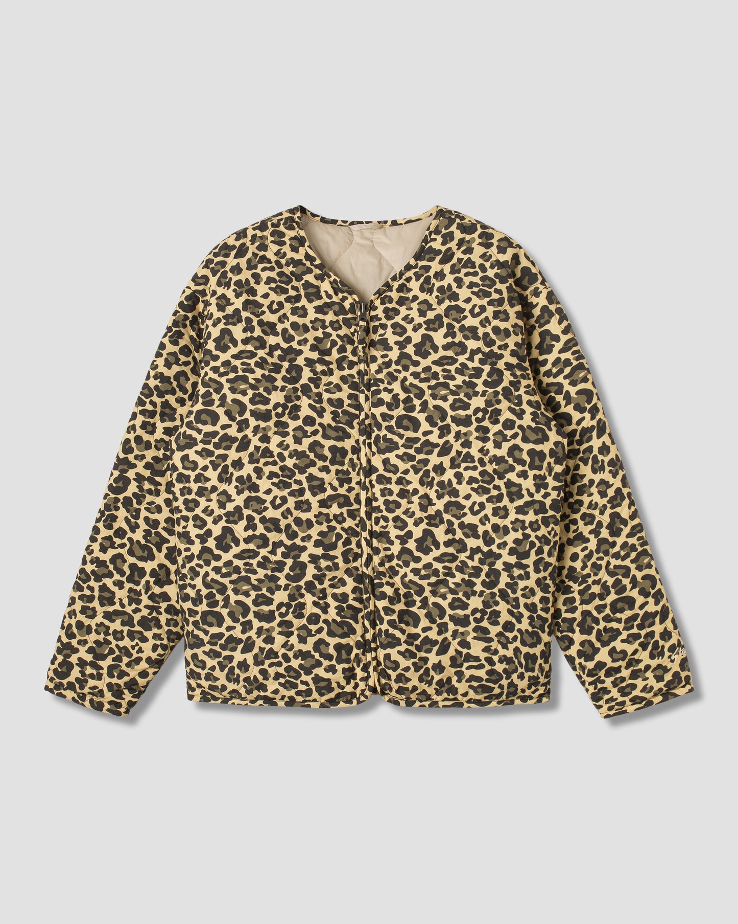 Veste matelassée (réversible camouflage léopard)