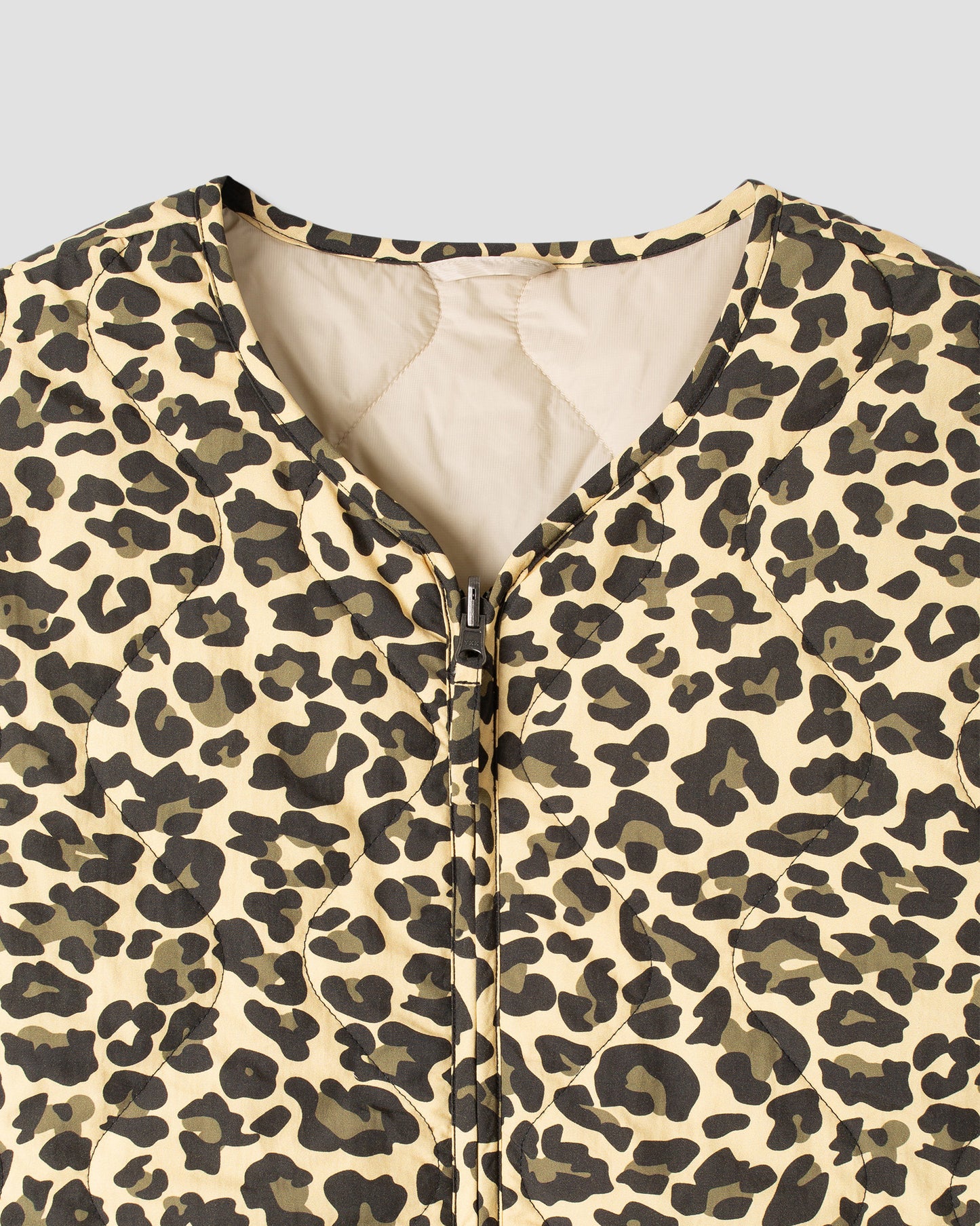Veste matelassée (réversible camouflage léopard)
