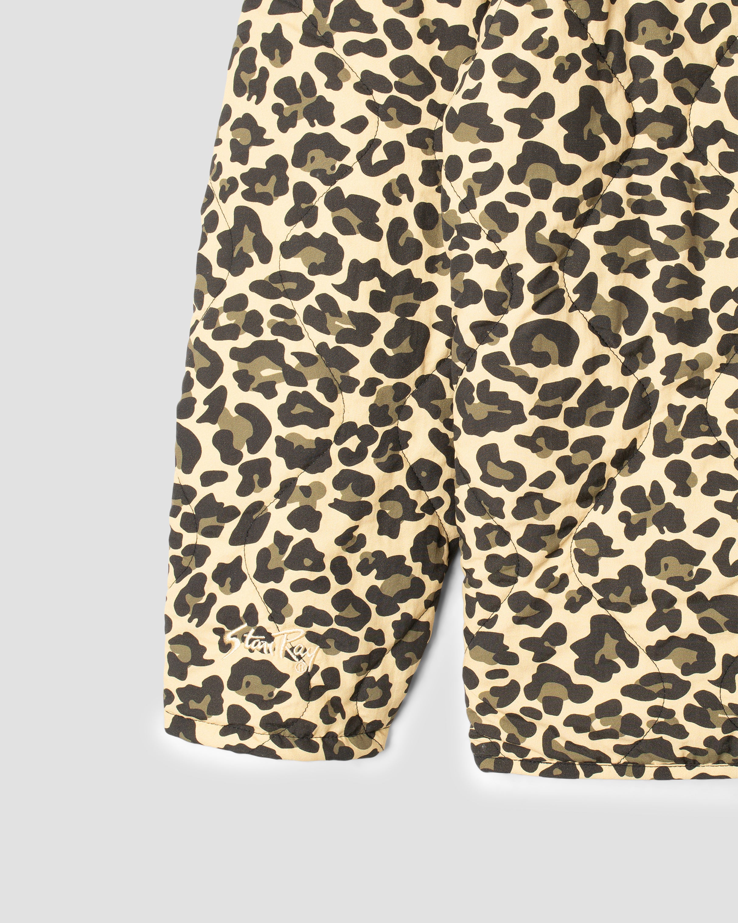 Veste matelassée (réversible camouflage léopard)