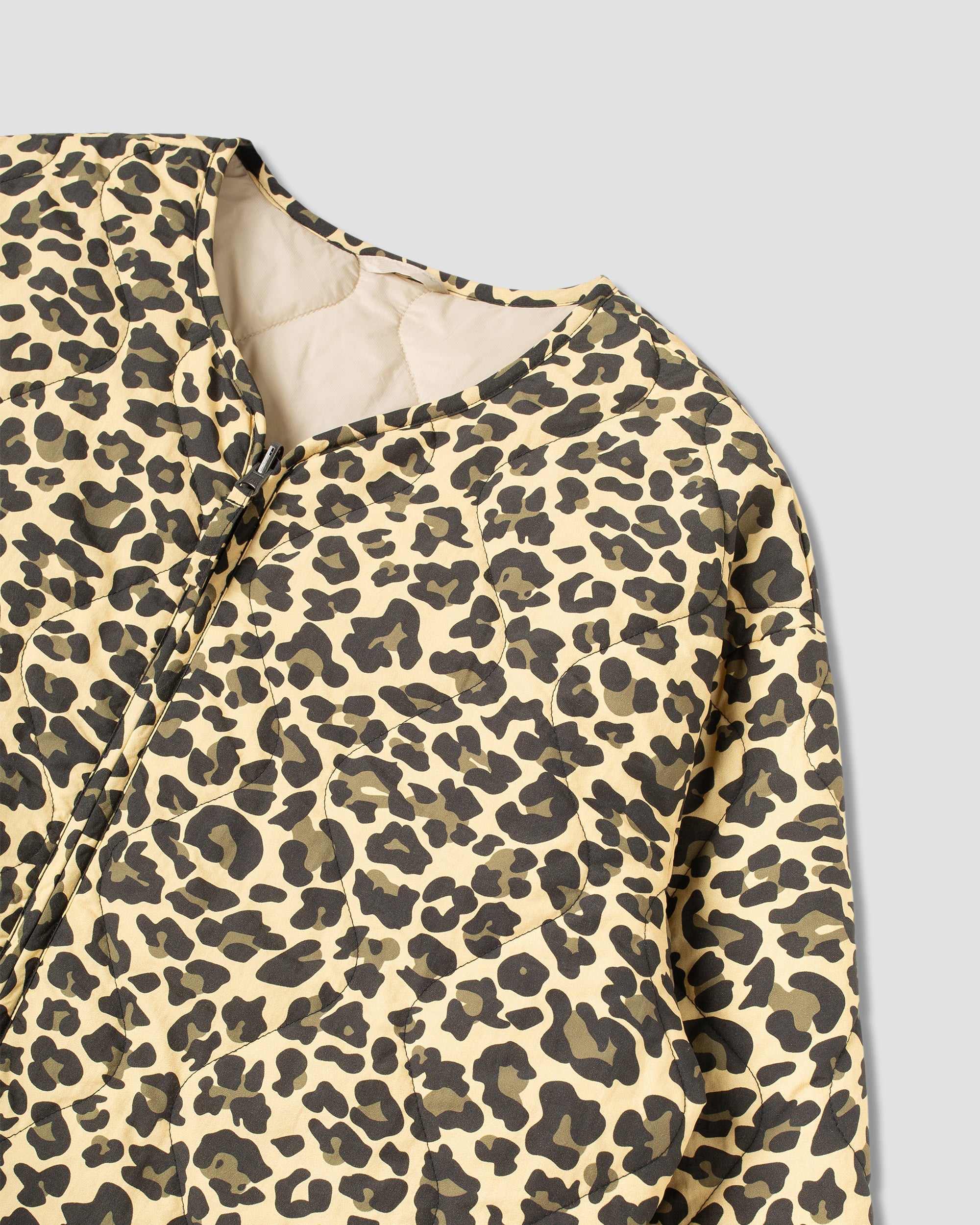 Veste matelassée (réversible camouflage léopard)
