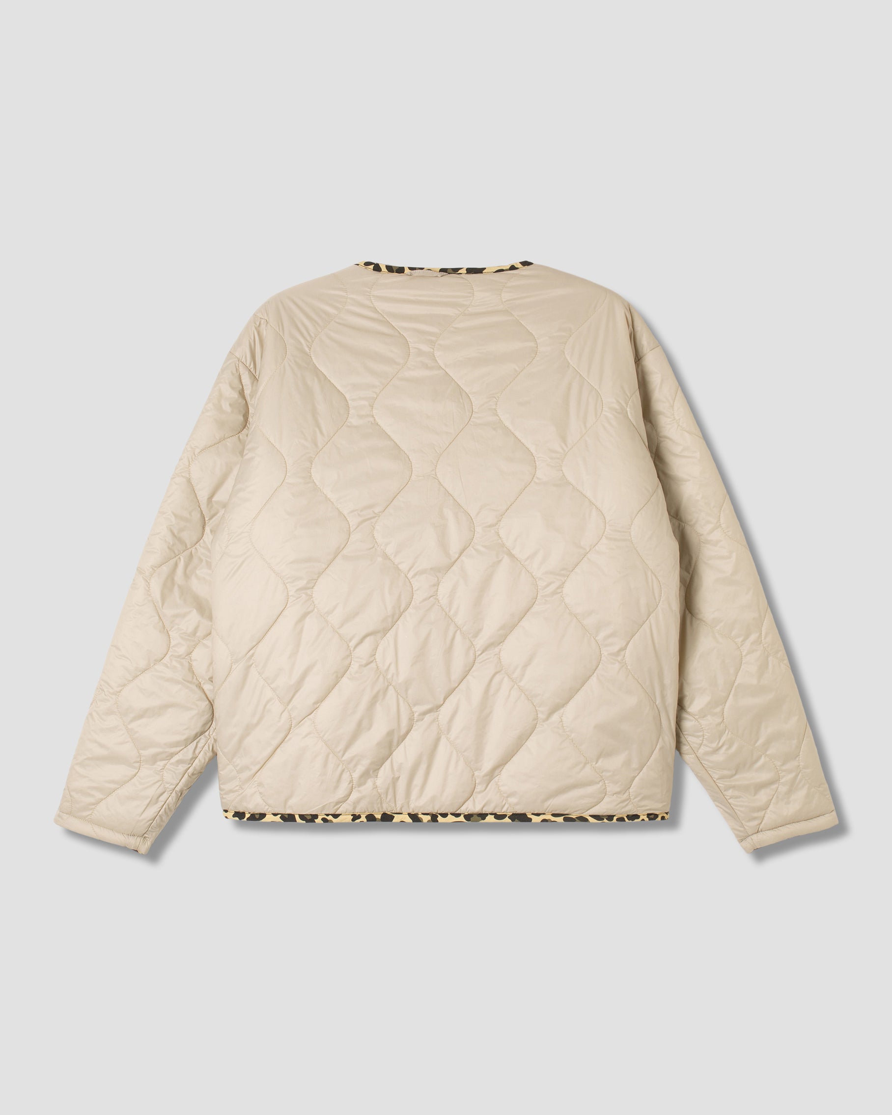 Veste matelassée (réversible camouflage léopard)