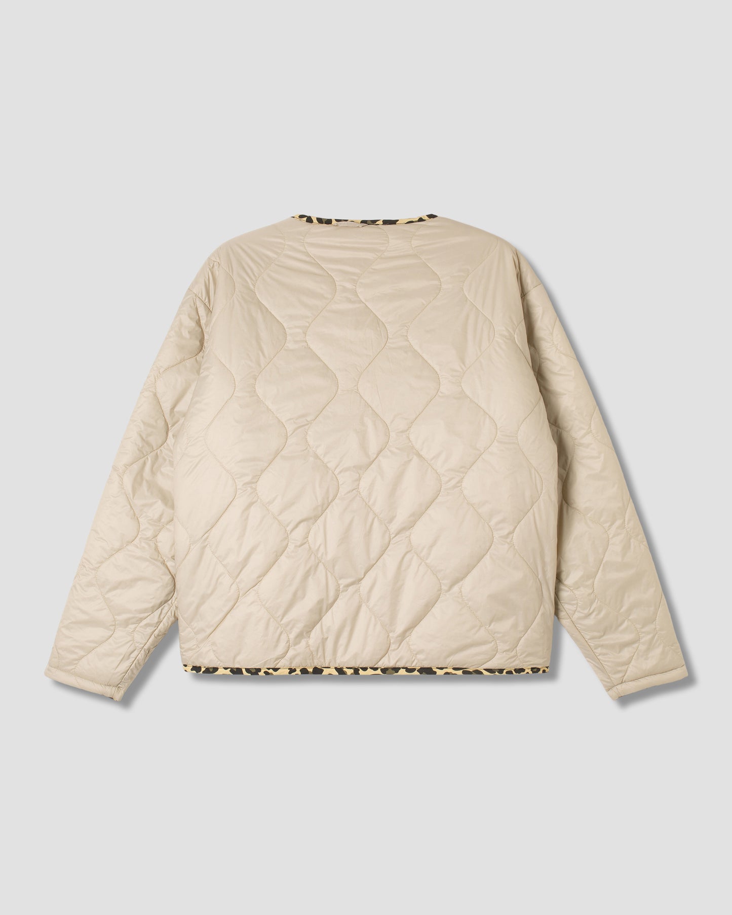 Veste matelassée (réversible camouflage léopard)
